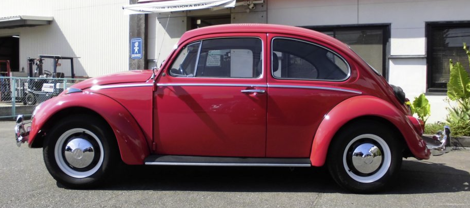 Stock Red VW Beetle with Stock Wheels